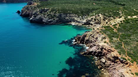 limestone headland of ponta da piedade in lagos, algarve, portugal. aerial drone shot