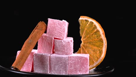 Delicious-scene-of-stacked-Turkish-Delight-with-orange-and-cinnamon