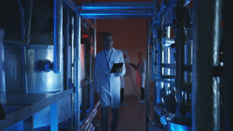 engineer inspecting industrial machinery