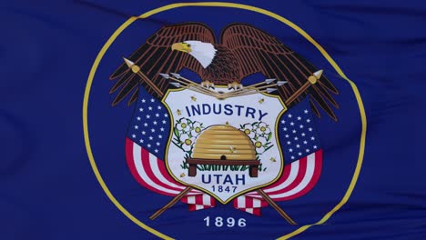 flag of utah state, region of the united states, waving at wind