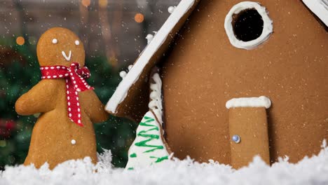 animación de navidad pan de jengibre muñeco de nieve y casa con nieve cayendo