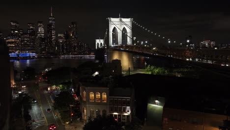 aerial view of the brooklyn bridge at night. shot during the summer of 2024 in 4k.