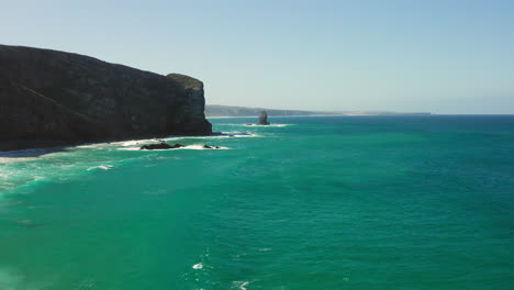 Aerial:-The-cliffs-near-the-town-of-Arrifana-in-Portugal