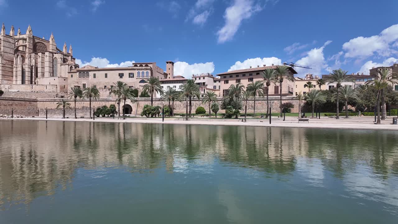 Motionlapse left to right of Palma de Mallorca historical city center in a splendid summer day with some clouds in a blue sky