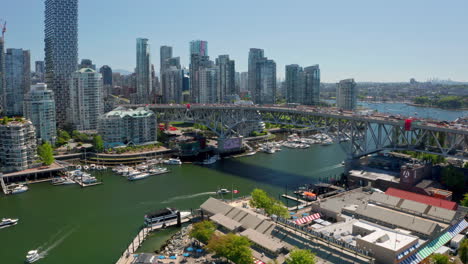 Traffic-At-Granville-Bridge-Over-False-Creek-With-Downtown-Vancouver-Skyline-In-Canada