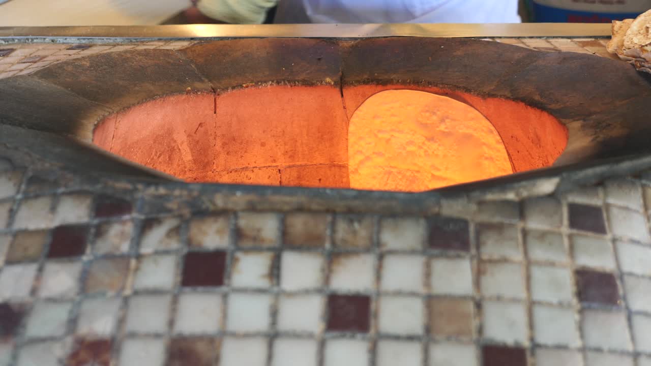 Baking Traditional Flatbreads in a Hot Tandoor Oven