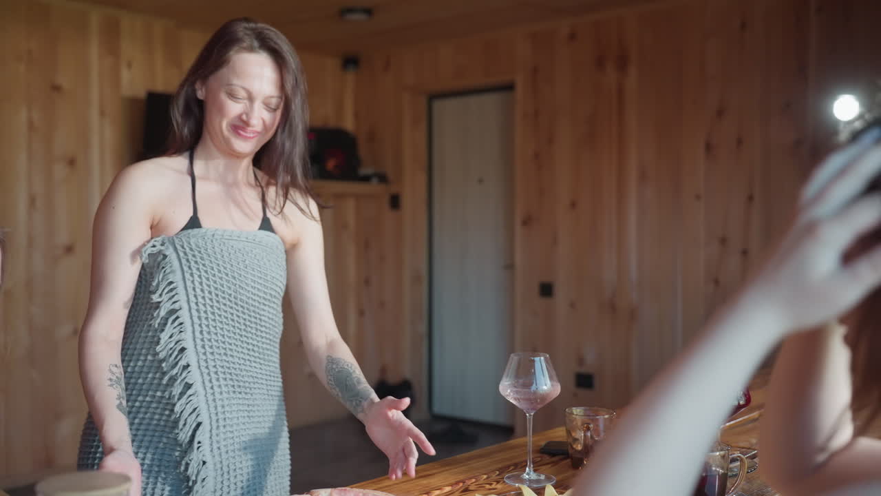 Happy elder sister showing her siblings pizza with a big smile, holding pizza tray in hand, dropping it onto table happily, cozy indoor setting with warm wooden background, family moment