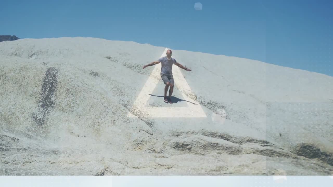 빛나는 원과 삼각형의 애니메이션 피트 아프리카계 미국인 노인 남자가 모래 언덕에서  ⁇ 고 있습니다.