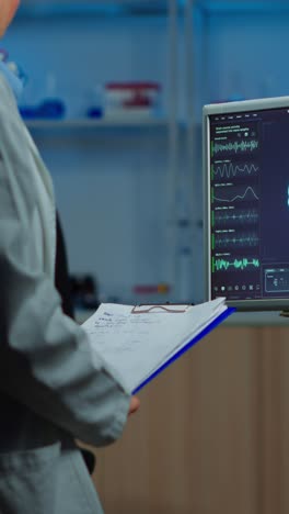 scientist analyzing brain activity data in a research laboratory