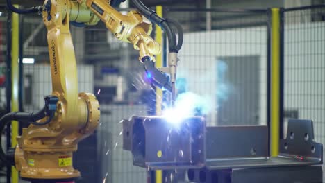 a high-tech industrial robotic arm expertly performing precision welding tasks on a metallic structure, showcasing advanced automation and innovation in manufacturing