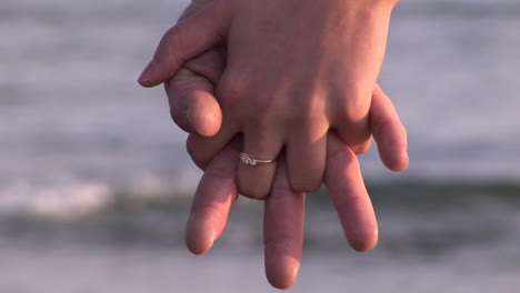 young couple holding hands