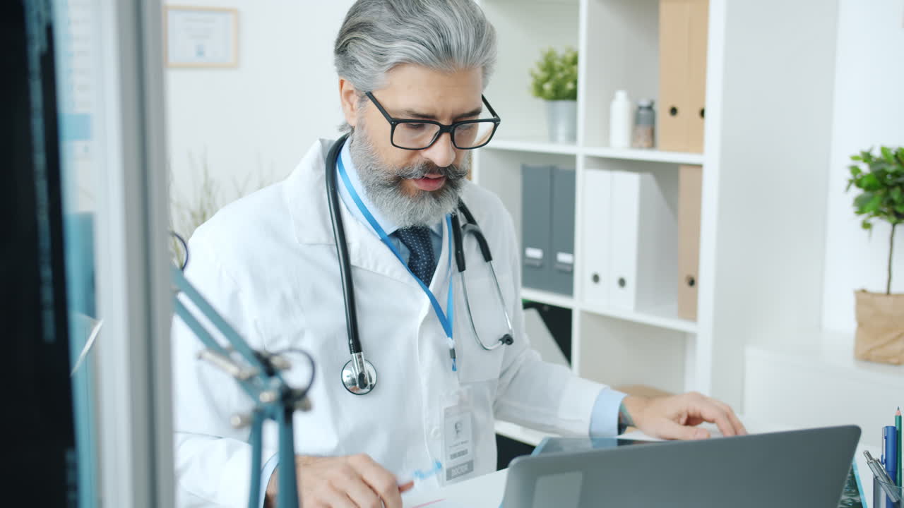 Doctor reviewing X-rays