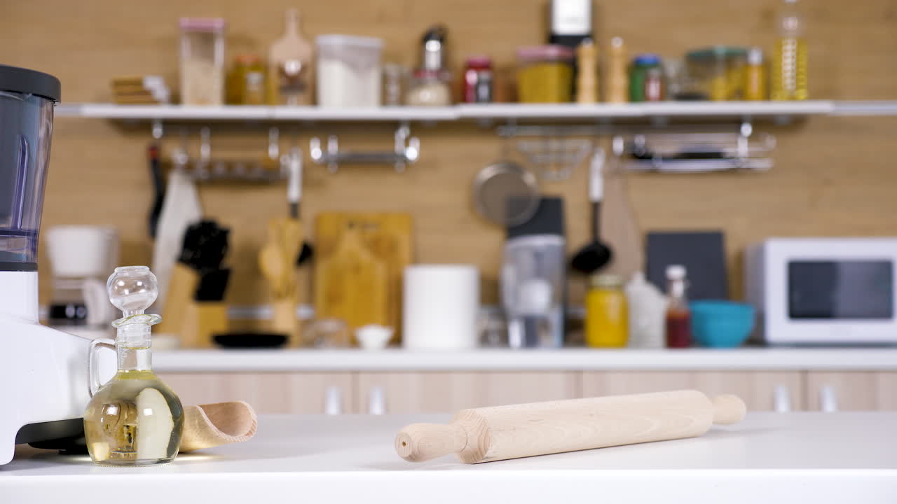 Kitchen scene with rolling pin and oil