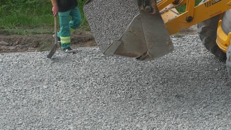 equipment excavator moving gravel