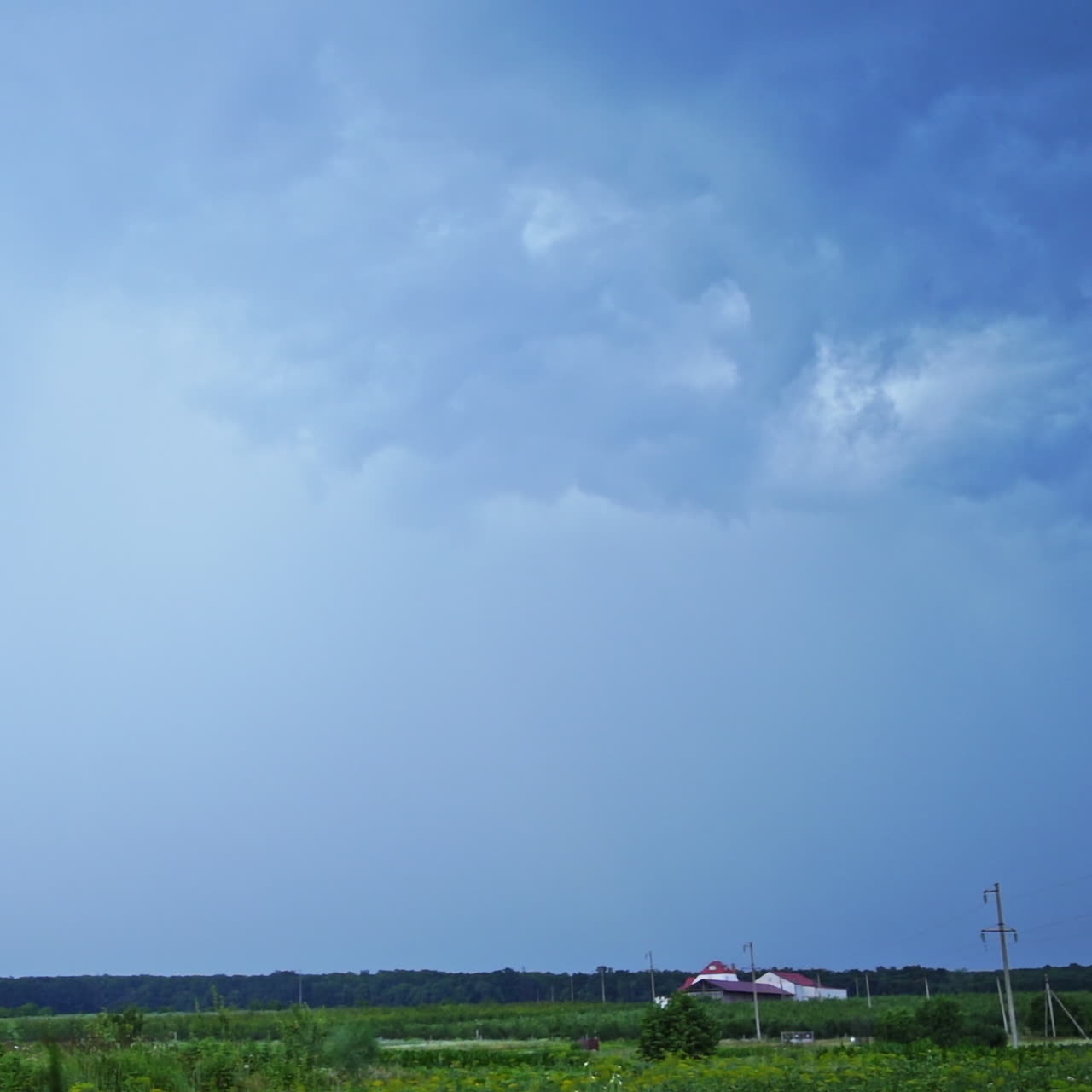 Bright lightning on the sky. Realistic view of direct lightning from sky to the ground in rural place. Dangerous time.