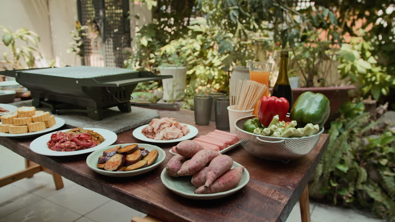 Outdoor Table with Snacks Prepared for Grill