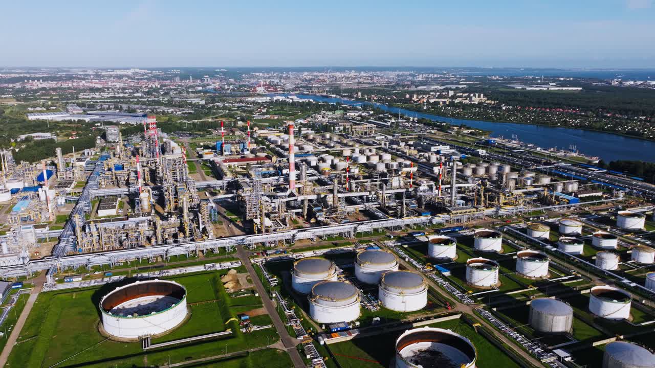 Large oil refinery with fuel storage tanks, industrial facilities in Europe