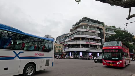 traffic and pedestrians in hanoi's old quarter