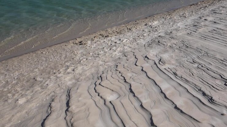 White Sand Dunes With Pristine Lagoon Water Revealed