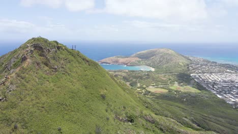 Mountain-range-on-a-tropical-island-with-ocean-water-in-background-and-a-peninsula