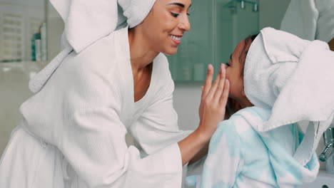 mother and daughter doing skincare routine