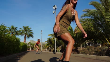 in the leisure of slow motion, a young woman glides on a longboard near palm trees, her summer outfit of shorts and sneakers enhancing the scene