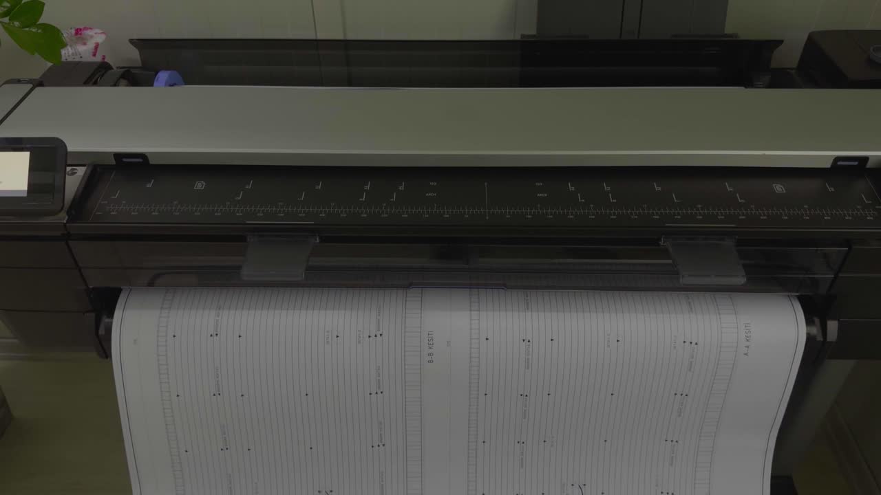 Ark papir kommer ud af printeren