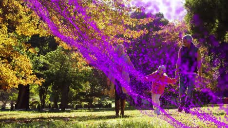 digital purple light trail bursting over purple digital people dancing against sports fans