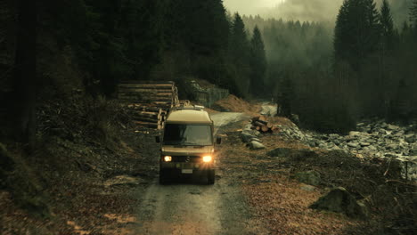 van driving through a mountain forest