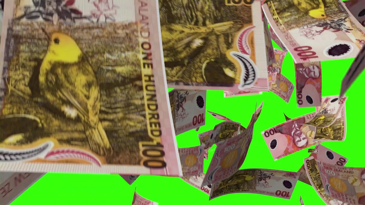 New Zealandske 100-dollarsedler falder på grøn skærm.