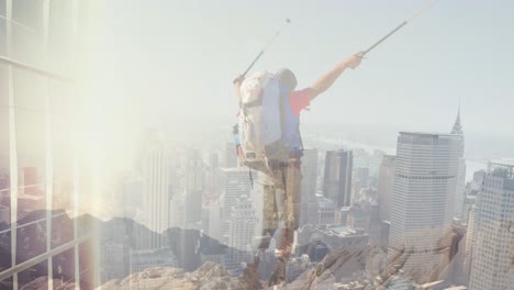 animation of cityscape over disabled caucasian man with arms outstretched hiking