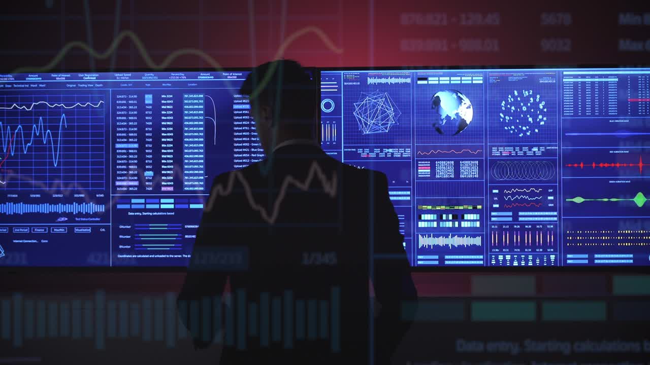 The businessman works with blue screen on a holographic background