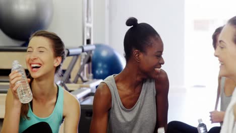 beautiful women relaxing in fitness studio