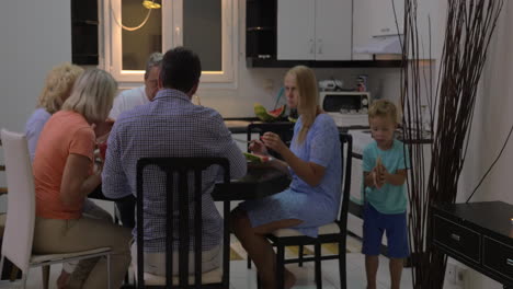 Family-eating-tasty-watermelon