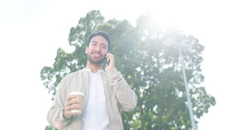 young businessman, outdoor phone call