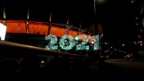 animation of new years eve text over cityscape