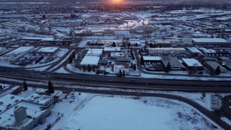 sunset over the rocky mountains viewed from the warehouse district in calgary