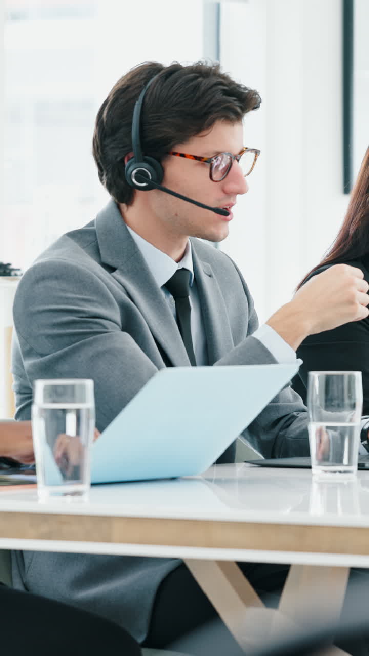 Man wearing a headset in an office