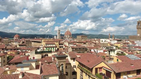 aerial view of florence tuscany italy cityscape with old medieval buildings urban skyline , drone approaching old cathedral duomo