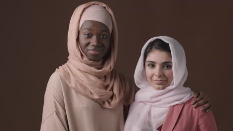 two women wearing hijabs