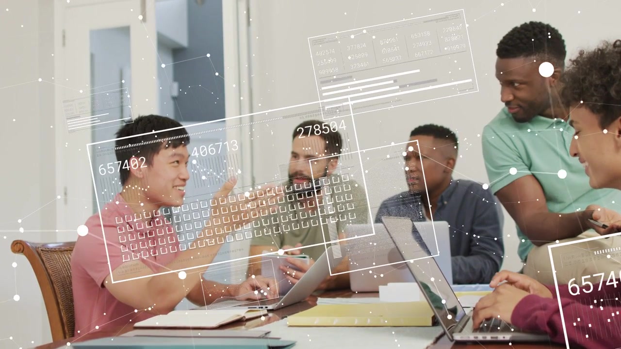 Five men business meeting at table, speaker typing, gesturing causing HUDs, team reviewing plan