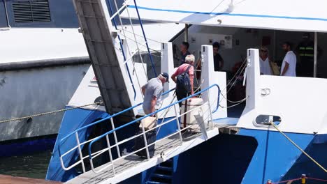 passengers boarding a ferry in sorrento, italy