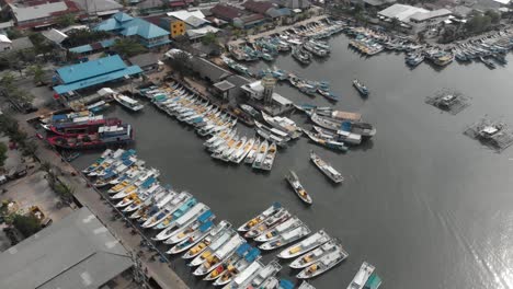 aerial view of tanjung pandan belitung island harbour full of small boats