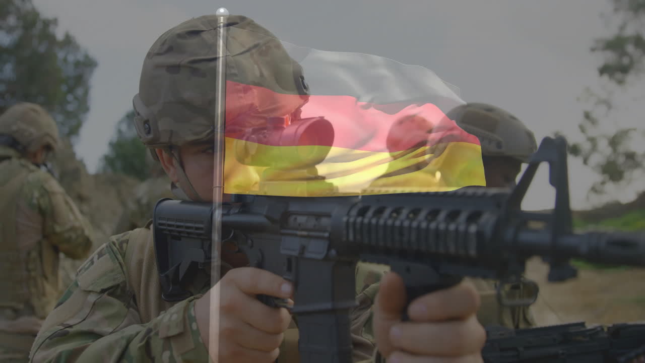 Soldato che mira con il fucile, con sovrapposizione della bandiera tedesca, in animazione militare all'aperto.