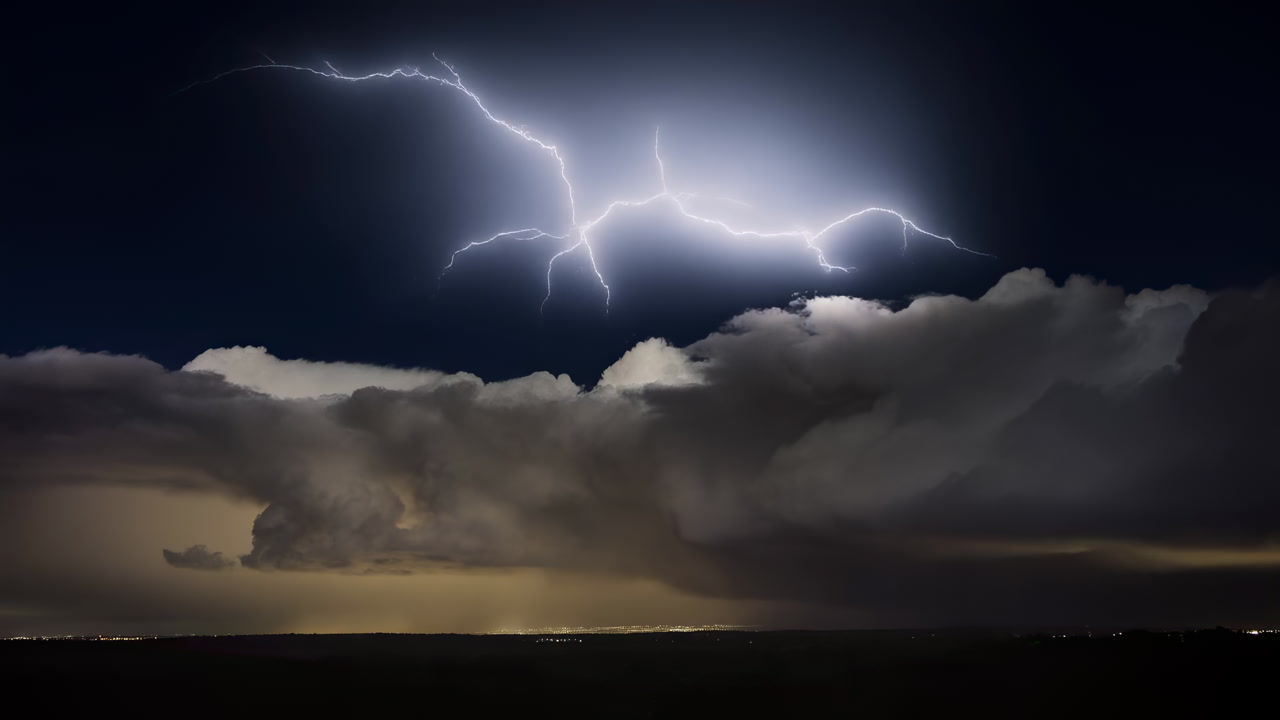 Night Thunderstorm With Lightning Striking Clouds, Cinematic K Footage Showing Bright Bolt Arcing