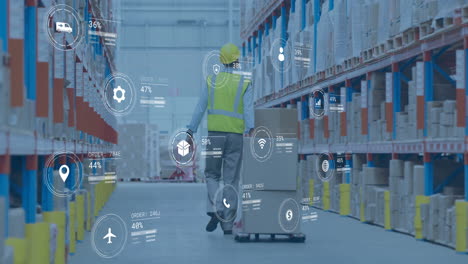 animation of data processing and media icons over caucasian male worker walking in warehouse