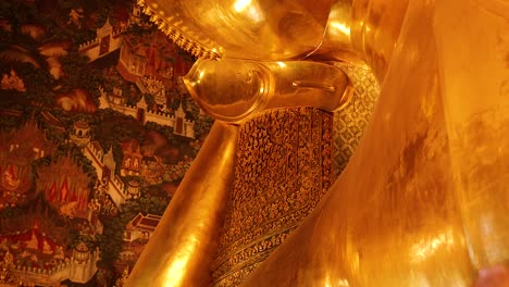 golden buddha statue in bangkok temple setting