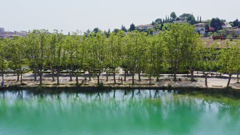 Tree-lined-avenues-along-the-shore-of-Lake-Banyoles-Catalonia-Spain