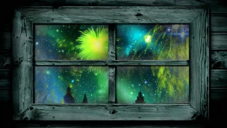 animación de la ventana con navidad verde y fuegos artificiales de año nuevo explotando en el cielo nocturno estrellado