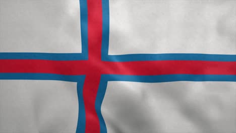 bandera nacional de las islas feroe soplando en el viento. bucle sin costuras